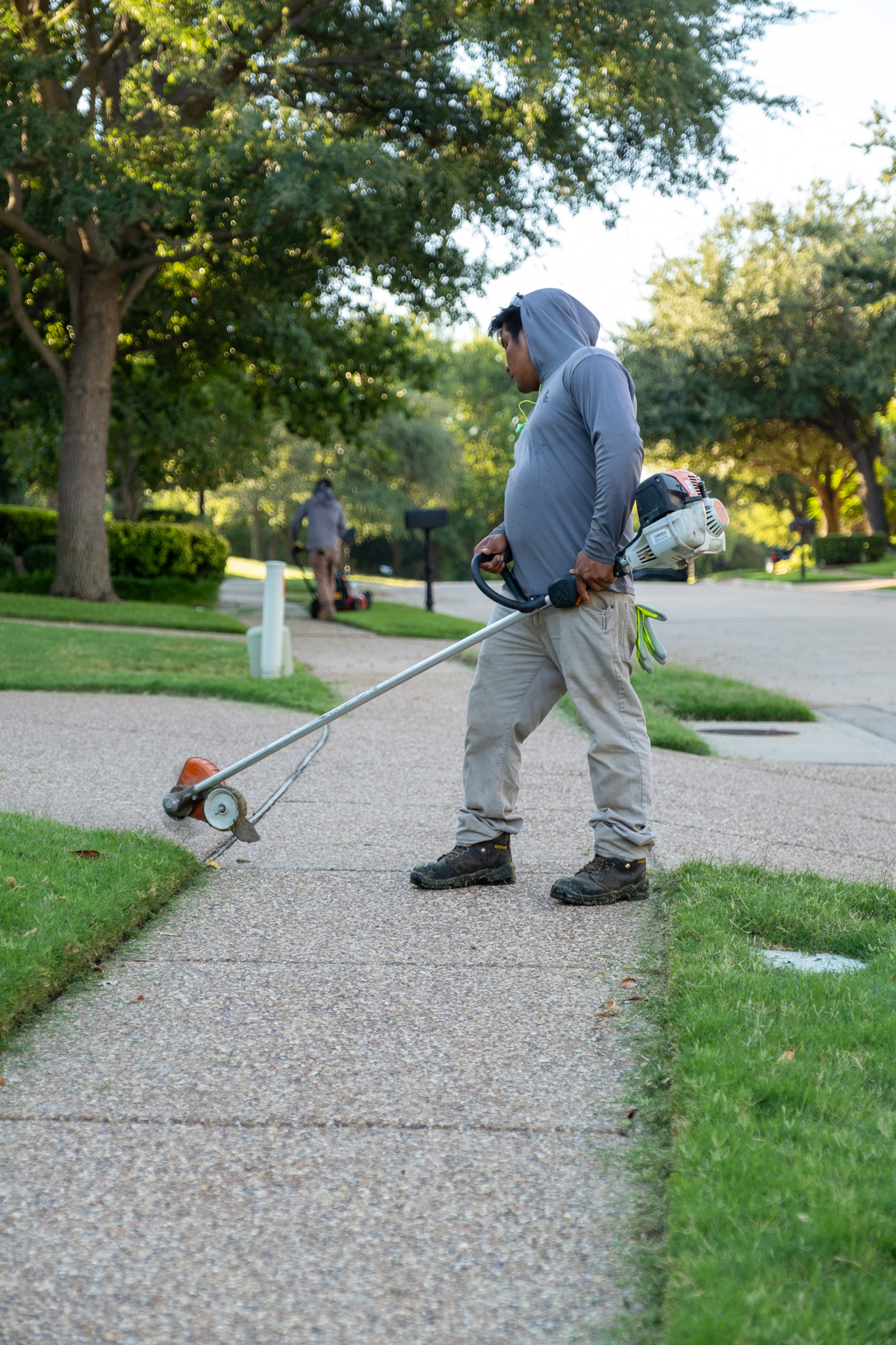 True Star crew edging community sidewalk